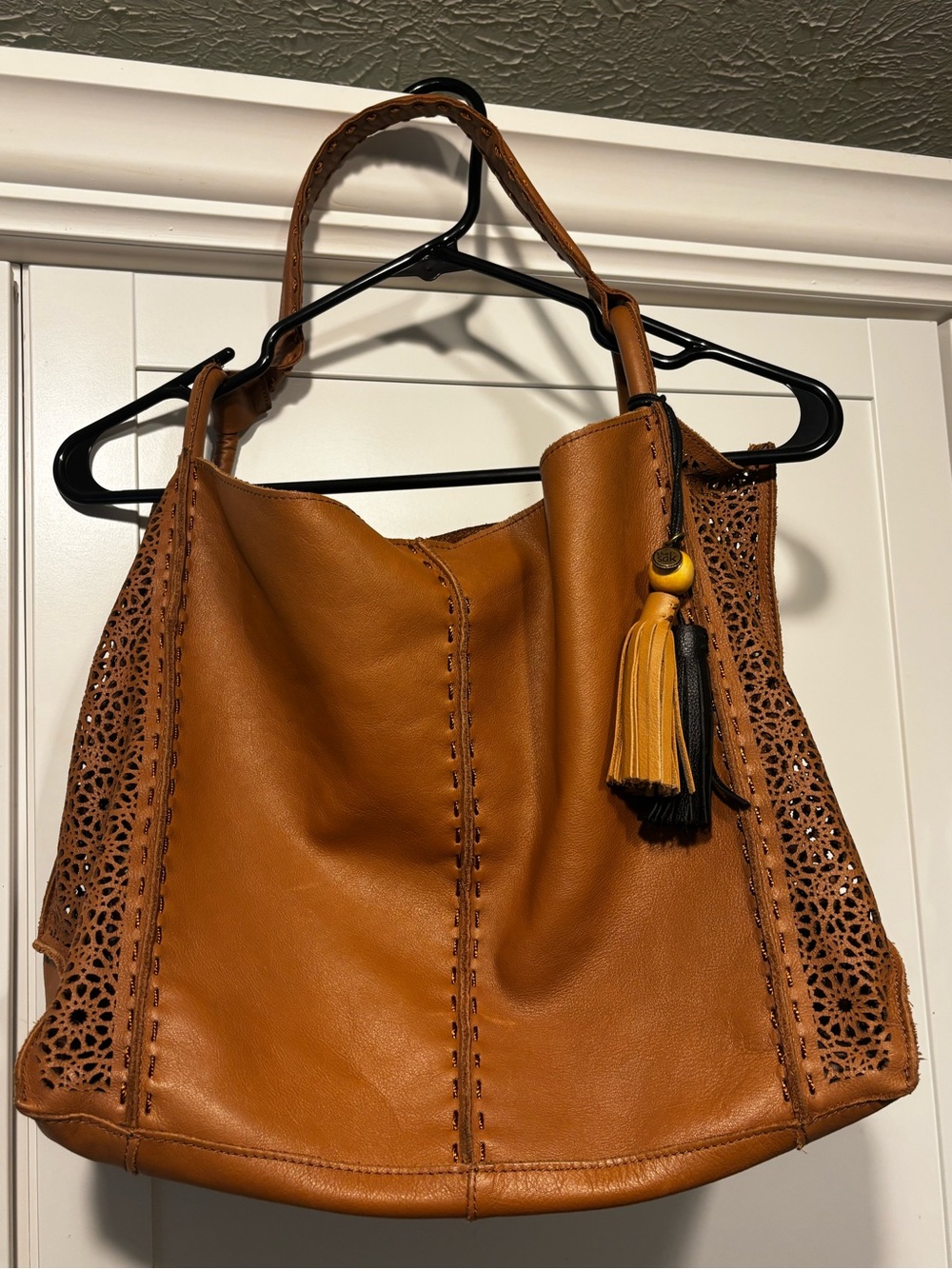 The Sak Laser-Cut Leather Hobo in Cognac - Picture 3 of 10